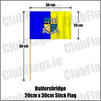 Butlersbridge 20cm x 30cm Stick Flag in blue and yellow, featuring the club crest on realistic fabric with gentle vertical folds; County Cavan GAA. ClubFlags.ie.