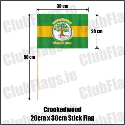 Crookedwood 20cm x 30cm Stick Flag in green and gold, featuring the club crest on realistic fabric with gentle vertical folds; County Westmeath GAA. ClubFlags.ie.