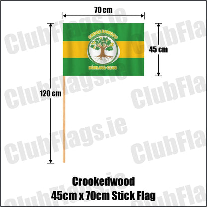 Crookedwood 45cm x 70cm Stick Flag in green and gold, featuring the club crest on realistic fabric with gentle vertical folds; County Westmeath GAA. ClubFlags.ie.