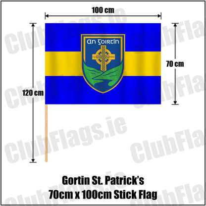 Gortin St. Patrick’s 70cm x 100cm Stick Flag in royal blue and yellow, featuring the club crest on realistic fabric with gentle vertical folds; County Tyrone GAA. ClubFlags.ie.
