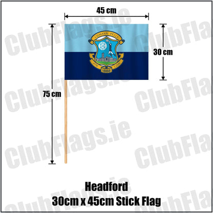 Headford 30cm x 45cm Stick Flag in sky-blue and navy, featuring the club crest on realistic fabric with gentle vertical folds; County Galway GAA. ClubFlags.ie.