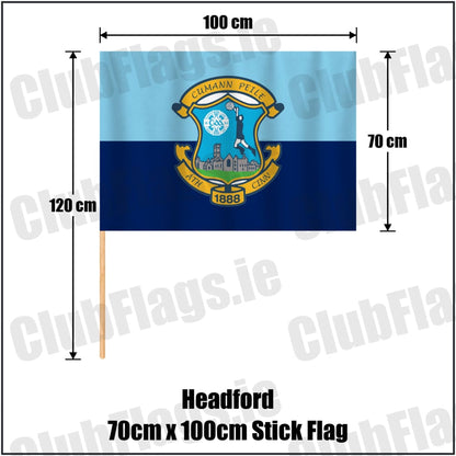 Headford 70cm x 100cm Stick Flag in sky-blue and navy, featuring the club crest on realistic fabric with gentle vertical folds; County Galway GAA. ClubFlags.ie.