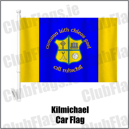 Kilmichael Car Flag in blue and gold, featuring the club crest on realistic fabric with gentle vertical folds; County Cork GAA. ClubFlags.ie.