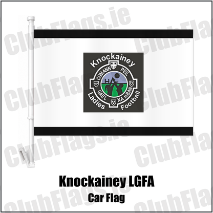 Knockainey LGFA Car Flag, featuring the Knockainey Ladies Football crest on black and solid white fabric with gentle vertical folds; County Limerick. ClubFlags.ie.