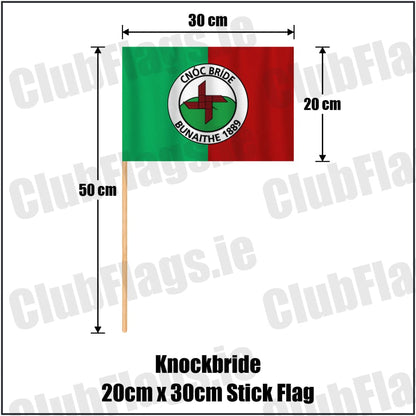 Knockbride 20cm x 30cm Stick Flag in green and red, featuring the club crest on realistic fabric with gentle vertical folds; County Cavan GAA. ClubFlags.ie.