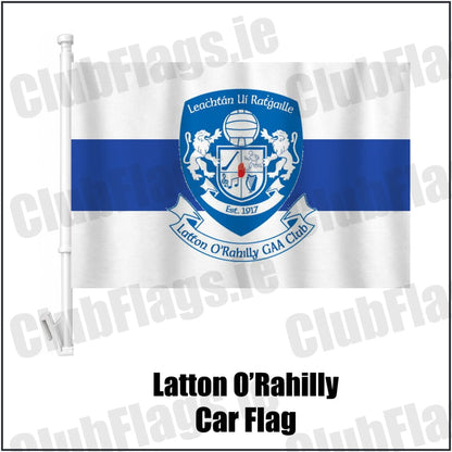 Latton O’Rahilly Car Flag in white and royal blue, featuring the club crest on realistic fabric with gentle vertical folds; County Monaghan GAA. ClubFlags.ie.